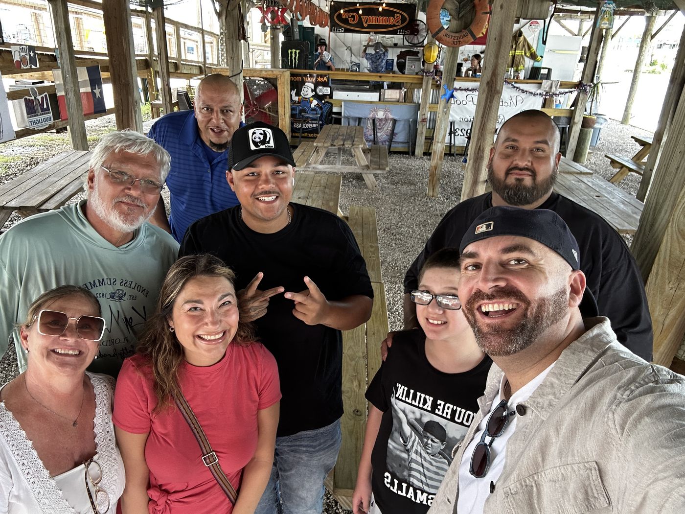 Pastor Omar taking a group selfie with friends from church